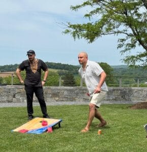 Peter Barkanic playing a yard game